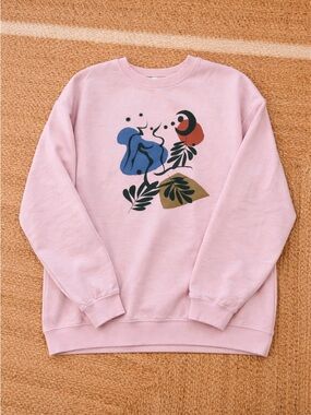 Urban Outfitters pink oversized graphic sweatshirt (size L/XL)